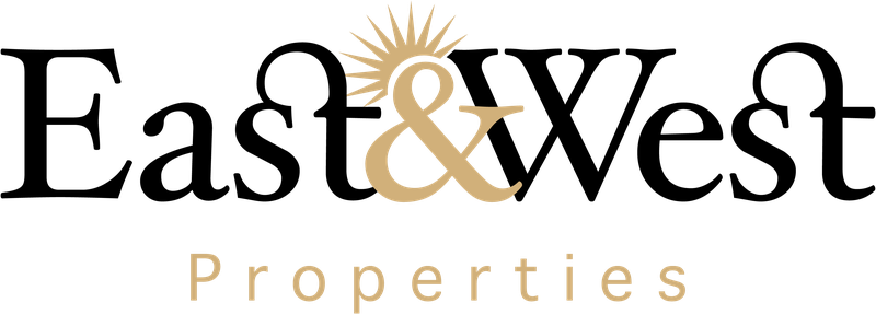 East & West Properties logo